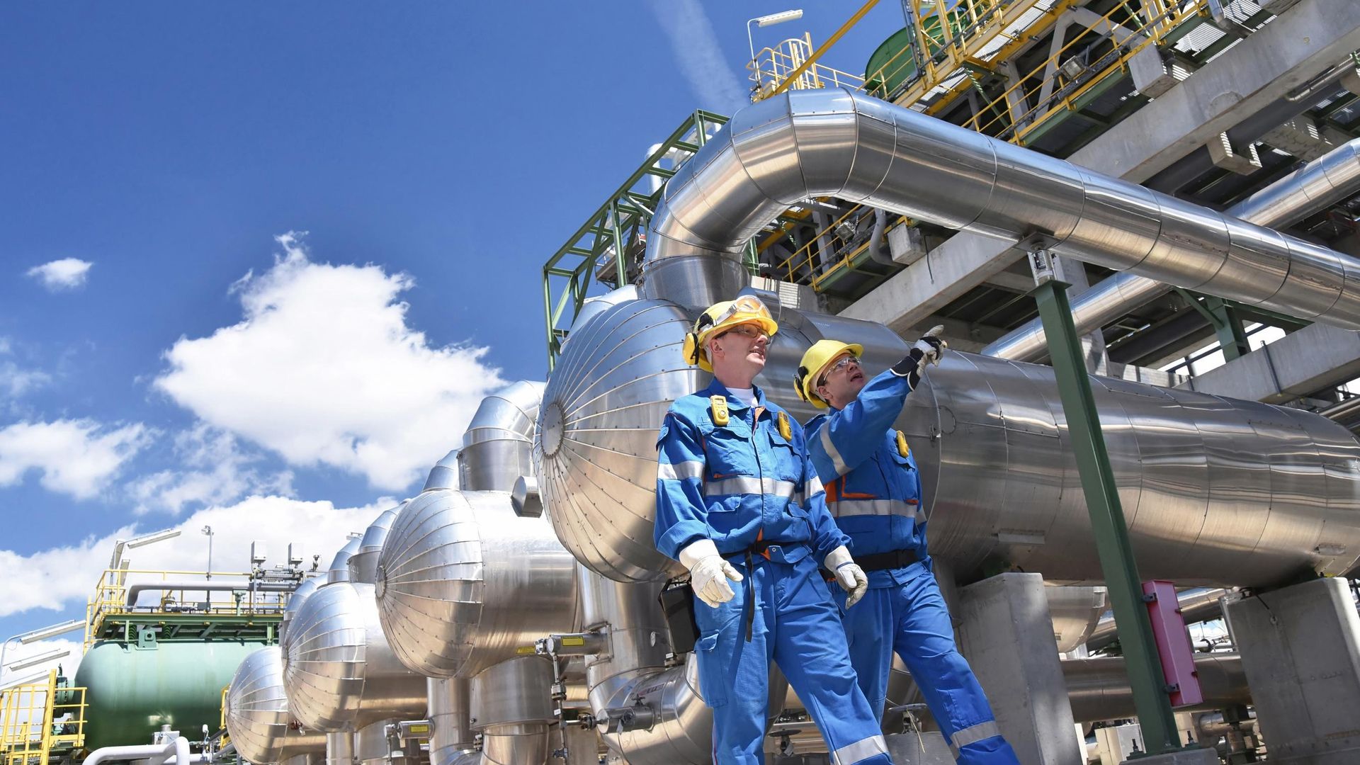 Sadara engineers inspecting process pipework at a refinery